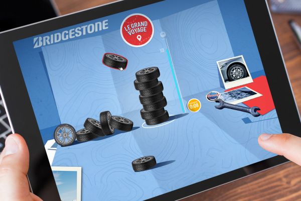Jeu d'empilement "Tour de pneus" pour le calendrier de l'avent Speedy 2024, développé par réalisé par Colombo, Agence Web & Gamification Avignon